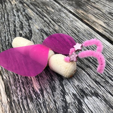 Crafting project, wooden butterfly with pink wings